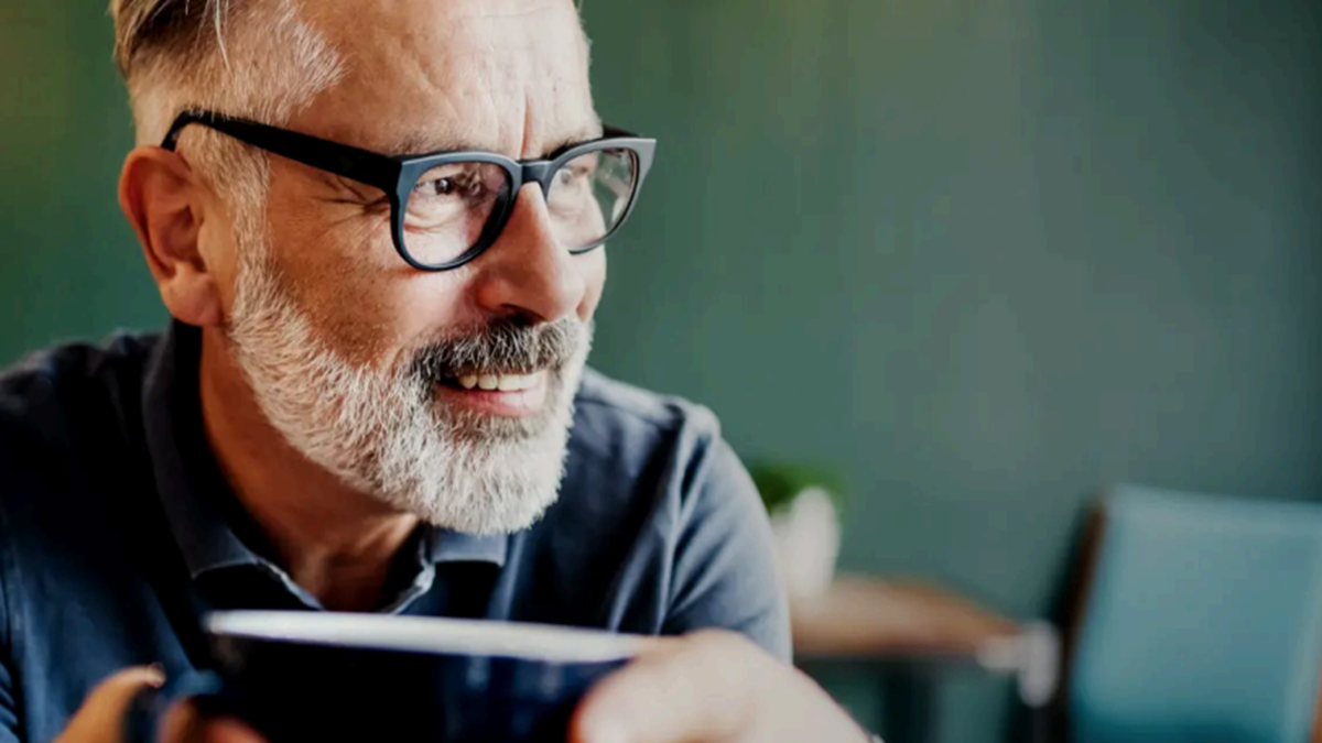 Professional user interacting with digital tools, representing streamlined customer experience operations enabled by the 8x8 CX platform