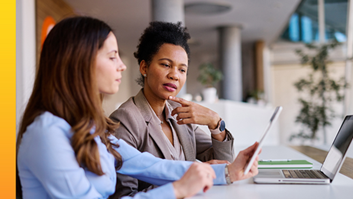 Two female employees using Lumen and Meter’s WAN and LAN solution