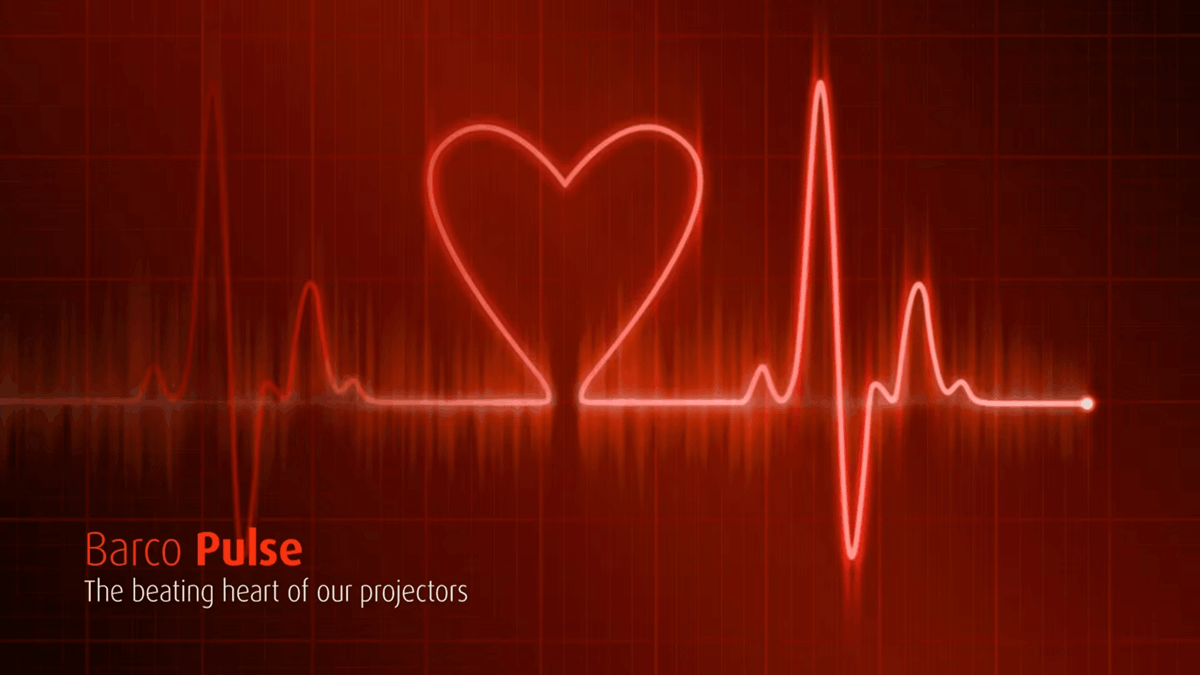 Promotional graphic for Barco Pulse featuring a glowing red heartbeat line forming a heart shape with the tagline "The beating heart of our projectors"