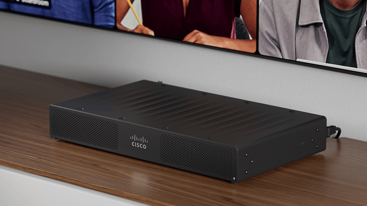 The Cisco Room Kit Pro G2 collaboration device placed beneath a conference room display