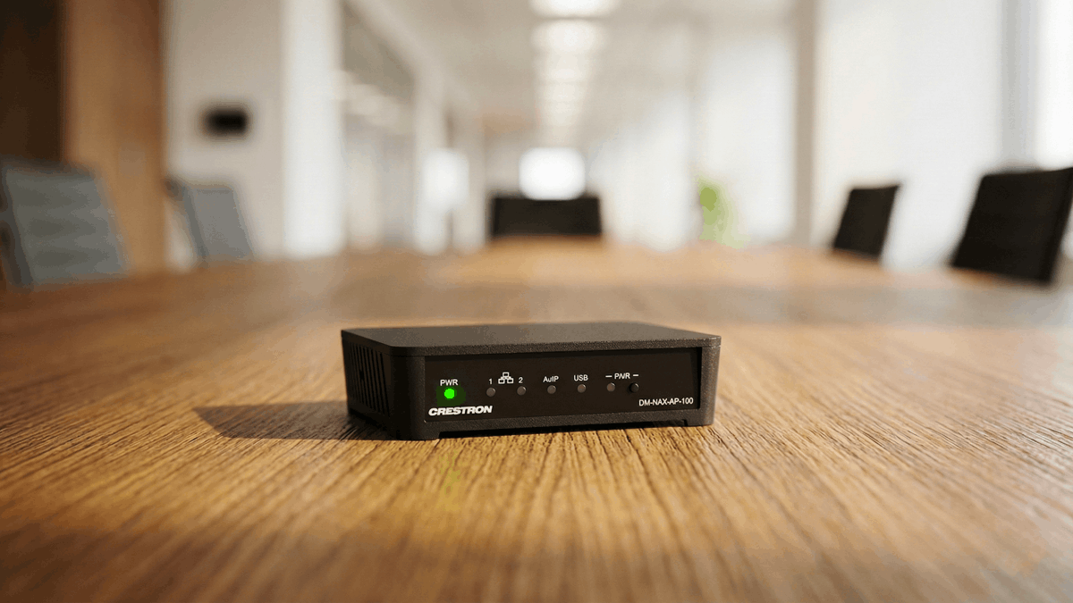Crestron’s DM NAX network-based audio platform on a meeting room table