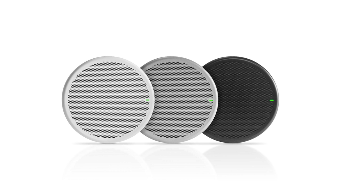 Shure MXA ceiling array microphones shown in white and black finishes