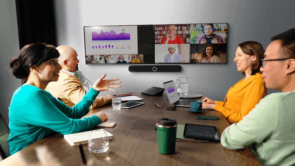 A group of employees in a hybrid meeting using Barco’s ClickShare bundle products