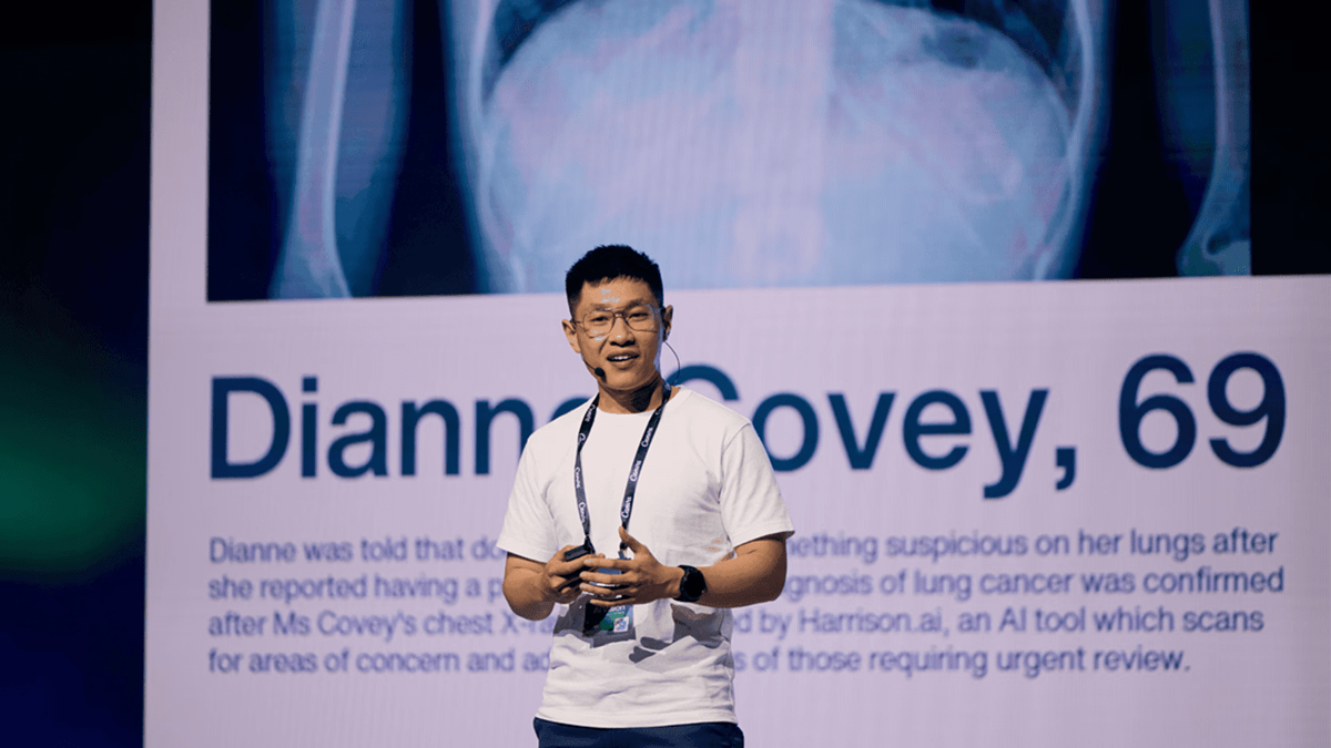Dr. Aengus Tran from Harrison.ai during the Canva AI Vision event, sharing the story of a patient diagnosed by Harrison’s AI system