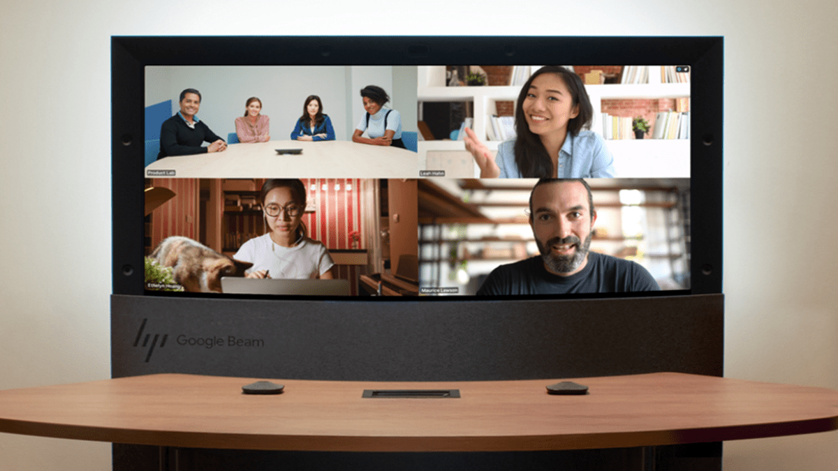 Participants engaging in a hybrid meeting showcased on the HP Dimension device with Google Beam technology