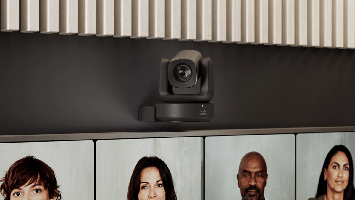 Cisco Room Vision PTZ Camera in Carbon Black, mounted on a meeting room wall