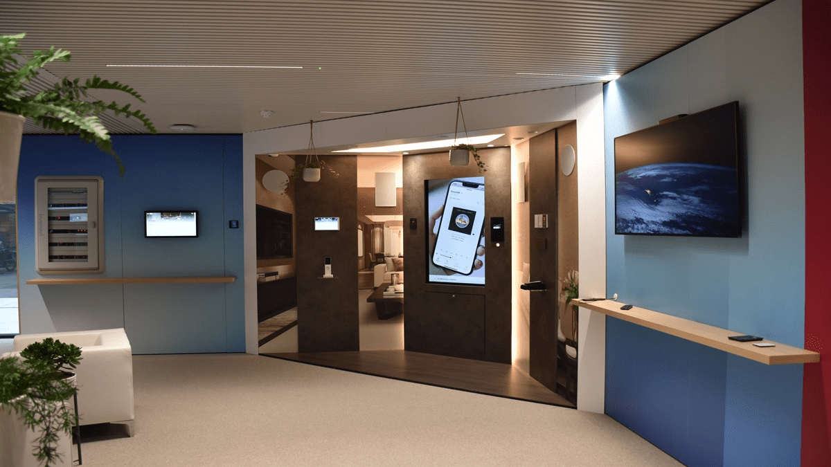 Interactive demonstration zone at the Crestron Experience Center showcasing smart home controls and integrated display technology