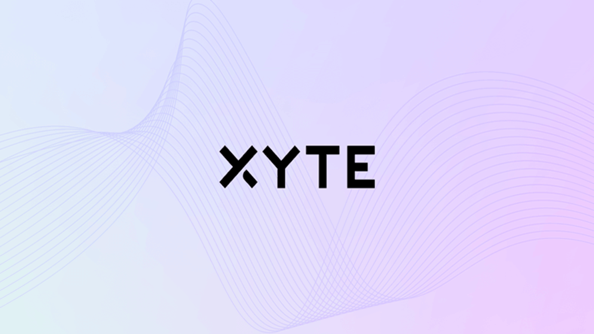 Xyte’s logo over gradient hues of pink, purple, and white