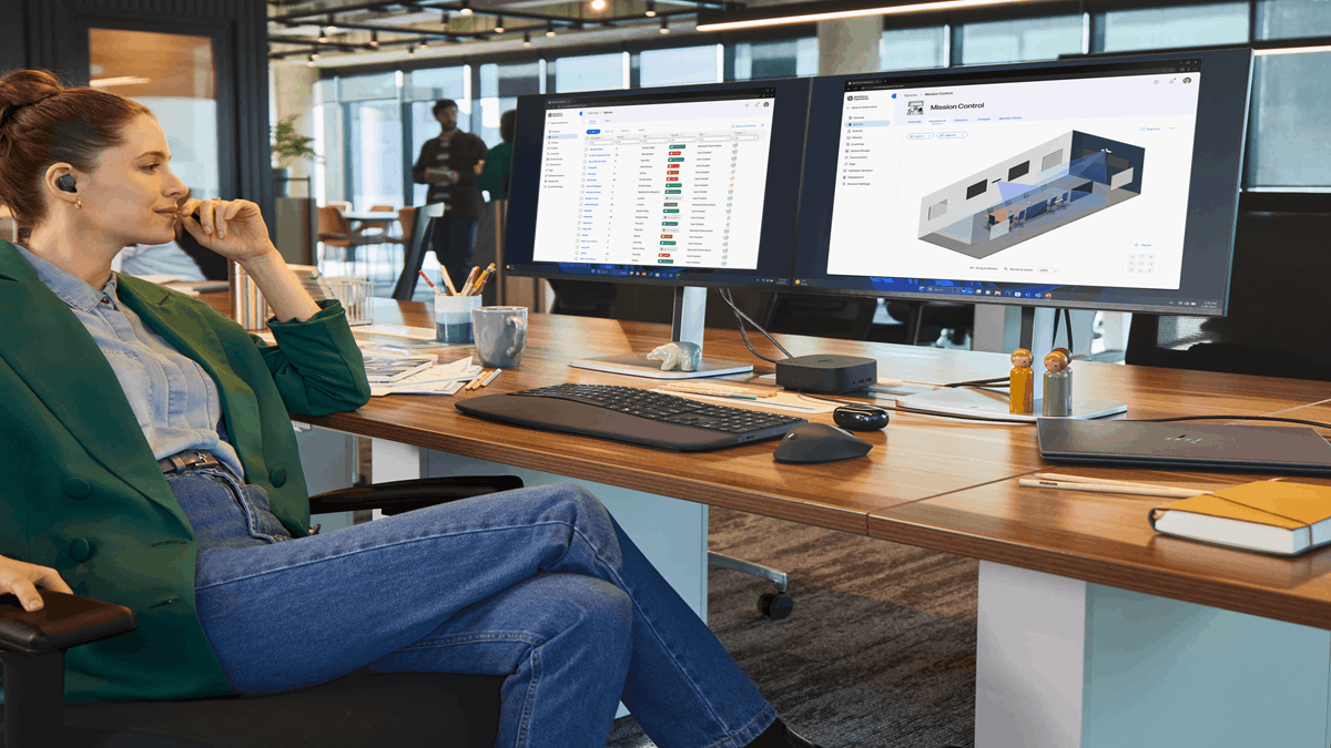 IT administrator using HP Poly Lens and HP Workforce Experience Platform to monitor collaboration spaces, devices, and room performance