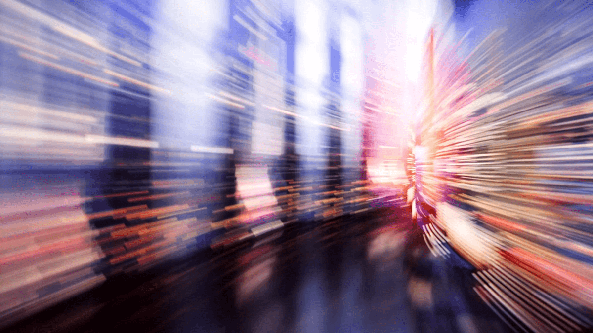 Streak of lights in motion blur representing the progression of Lenovo’s offering with Agentic AI